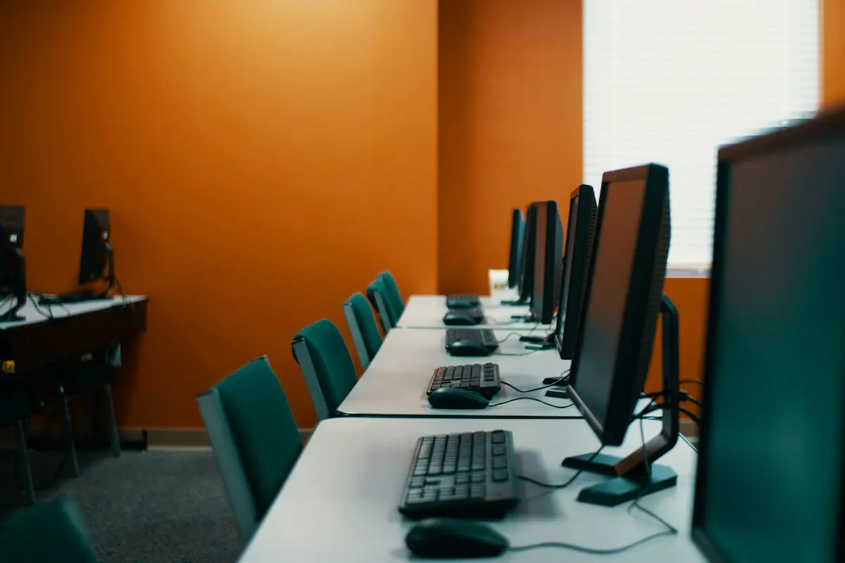 Row of desks with new computer workstations