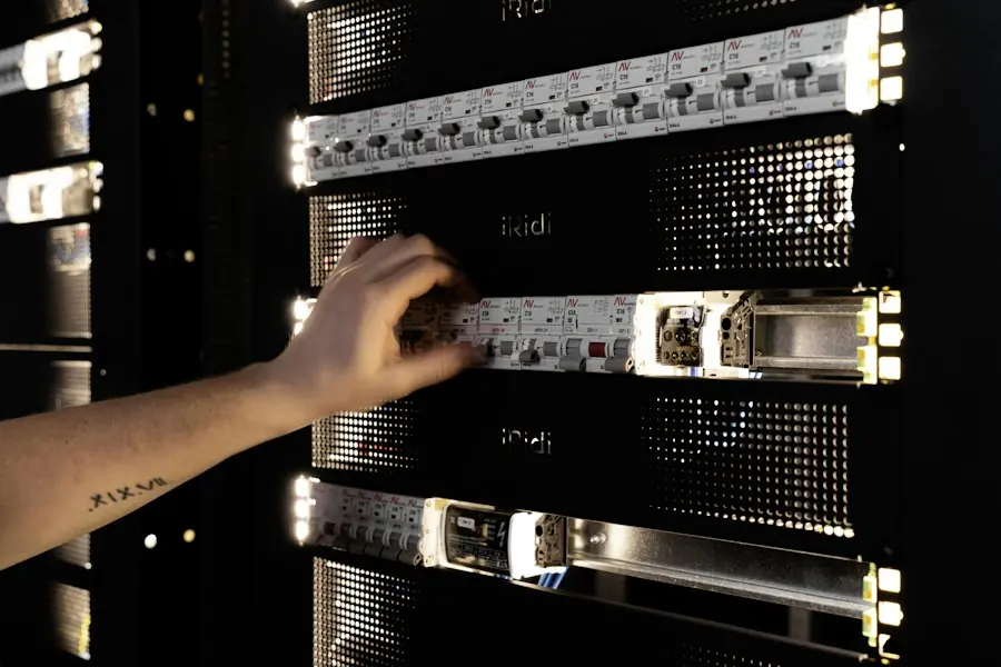 Technician adjusting equipment in a server rack
