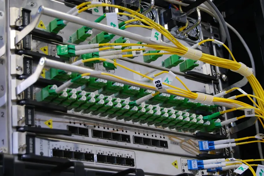 Fibre and network cables connected to a business network switch